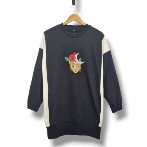 jersei llarg bordat rugit